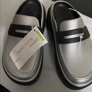 CROCS women's Metallic Silver and Black clogs